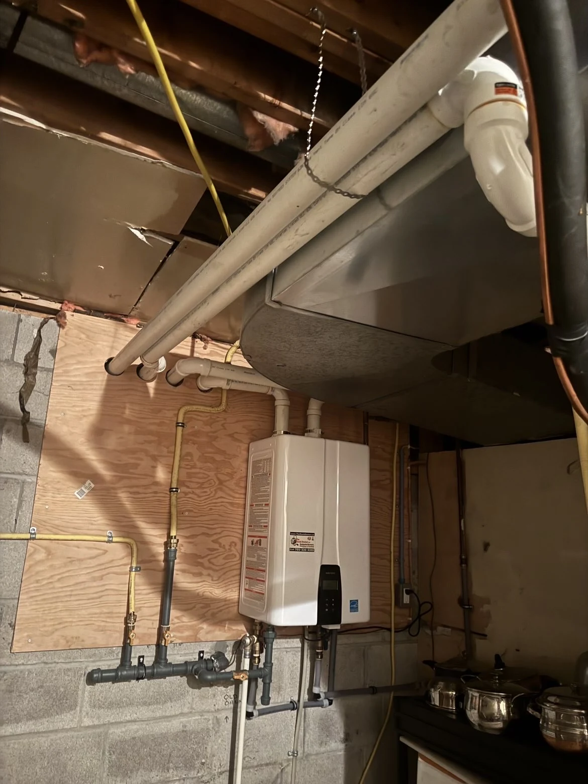 Wall-mounted tankless water heater